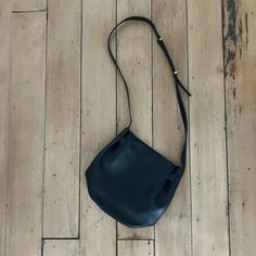 Great Condition - On Trend Bucket-Like Style. Adjustable Strap. Canvas Lining And Interior Pockets Dimensions: 11h X 12w X 5d Strap Hangs 22.5 Inches From Middle Of The Strap (On Shortest Length) Cuyana Bag, Leather Bucket Bag, Leather Bucket, Bucket Bag, Adjustable Straps, Black Leather, Bag Lady, Canvas, Leather