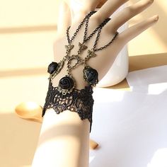 Gender:Women's; What's in the box:Bracelets; Types:Accessories; Holiday:Masquerade,Carnival,Halloween; Style:Punk  Gothic,Retro Vintage; Jewelry Type:Ring Bracelet / Slave bracelet; Material:Alloy; Characters:Goth Girl; Design:Lace; Shipping Weight:0.022; Package Dimensions:12.010.03.0; Listing Date:11/15/2022 Bracelet With Ring, Steampunk Pirate, Gothic Bracelet, Steampunk Victorian, Lace Bracelet, Gothic Accessories, Black Retro, Victorian Lace, Wristband Bracelet