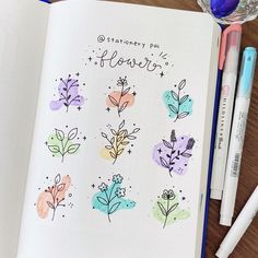 an open notebook with flowers on it