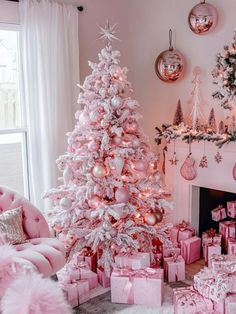 a pink christmas tree in a living room