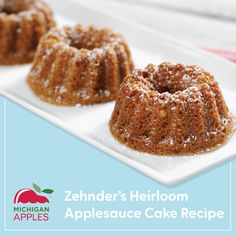 two bundt cakes sitting on top of a white plate next to an apple logo