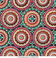 an abstract pattern with circles and flowers in red, blue, green and orange colors