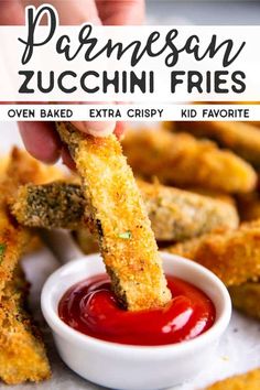 someone dipping sauce on some fried food in a small white bowl with the words parmesan zucchini fries over it