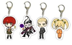 four key chains with cartoon characters on them