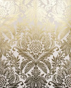 gold and white wallpaper with an intricate design