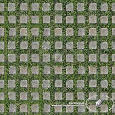 an aerial view of grass and cobblestones