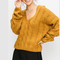 This lightweight cable knit sweater in mustard featuring a v-neckline and relaxed fit is the perfect weather wardrobe statement for your winter. Soft Cable Knit Fabrication Unlined 100% Acrylic Hand Wash Cold, Lay Flat to Dry Imported Small: Length 21" Medium: Length 21.5" Large: Length 22" Mustard Sweater Affordable, Mustard Cable Knit Sweater, Mustard Sweaters, Perfect Weather, Jumpsuits And Romper, New School Year, Lightweight Sweater, Knit Pullover, Knit Outfit