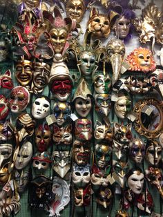 many different types of masks are on display