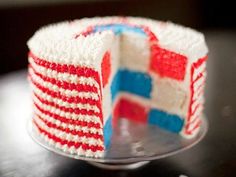 a red, white and blue cake on a plate