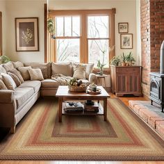 Material Jute Style Indoor Color Brown - Deep Red Braided Rug Shape Rectangular BROWN BRAIDED RUG: Golden wheat and honey beiges are accented with hints of russet and dark green. The soft and neutral palette makes this customer-favorite design an easy one to coordinate with many other colors in your home. It will look good in your home for years to come. PET FRIENDLY DURABLE FIBERS: We use long fiber Jute yarn for better durability. Jute is natural and environmentally-friendly and pet friendly. Large Living Room Rug, Foyer Rugs, Jute Yarn, Black Rugs, Making Rugs, Primitive Living Room, Pet Hair Vacuum, Large Living Room Rugs, Brown Dining Table