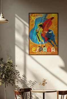 a table and chairs in a room with a poster on the wall above it that says epana