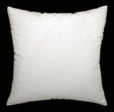 a white pillow on a black background