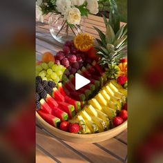 a bowl filled with lots of different types of fruit