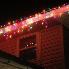 christmas lights on the roof of a house