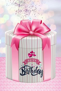 a birthday card with a pink bow on top of a gift box and sparkles in the background