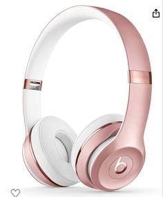 the beats by dr dre headphones are pink, white and rose gold color