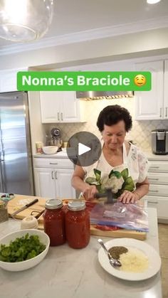 a woman is making some food in her kitchen with the caption nonna's braciole