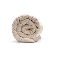 an image of a blanket that is folded up in the shape of a spiral on a white background