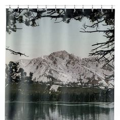 the mountains are reflected in the water shower curtain