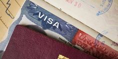 three different types of passport sitting next to each other on top of one another with the word visa printed on it