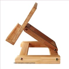 a wooden object that is on top of a stand