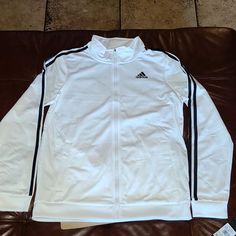 Brand New Size Boys X-Large Addidas With Tags Color White Black Strips White Sports Outerwear With Three Stripes Branding, White Winter Sweatshirt With Three Stripes Branding, Winter White Sweatshirt With Three Stripes Branding, White Long Sleeve Sweatshirt With Three Stripes, Adidas White Athleisure Track Jacket, Hooded Track Jacket With Three Stripes For Fall, White Hooded Track Jacket Athleisure, White Hooded Track Jacket In Athleisure Style, White Hooded Track Jacket For Winter