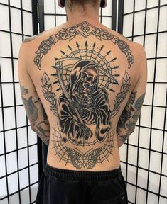 a man with a tattoo on his back