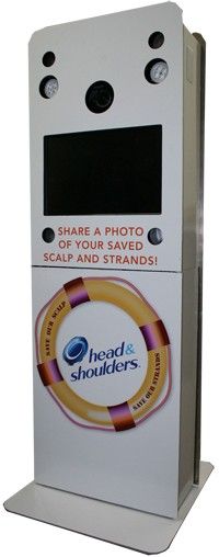 an electronic photo booth with the words, share a photo of your saved scalpp and strands