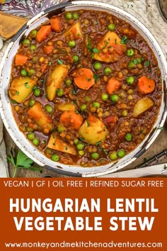 vegetarian lentil vegetable stew in a pot with text overlay that reads vegan glub free refried sugar free hungarian lentil vegetable stew