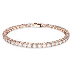 PRICES MAY VARY. Length: 6 7/8 inch; Width: 1/8 inch Warm and scintillating at the same time, this gorgeous bracelet is crafted with a complete circle of clear stones on a rose gold-tone plated setting Each of the crystals wonderfully reflects the light, ensuring your wrist remains eye-catching wherever you go Enjoy this timeless piece of jewelry for yourself or consider it as a beautiful gift idea Rose Gold Jubilee Tennis Bracelet For Wedding, Rose Gold Cubic Zirconia Tennis Bracelet For Party, Formal Rose Gold Cubic Zirconia Tennis Bracelet, Rose Gold Cubic Zirconia Tennis Bracelet Gift, Elegant Rose Gold Cubic Zirconia Tennis Bracelet, Swarovski Bracelet, White Crystals, Swarovski Jewelry, Rose Gold Bracelet