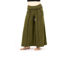 Palazzo style pant, fitted at waist via elastic, flows out in an A-shape. Stretchy and comfortable. Looks like a skirt, comfortable like a pant. Free flowing and wonderful to dance in. These are made with the overlock stitch detail which is an unfinished rough stitch look.! Our new model has a shorter inseam then our usual Boho Pant, which means you can wear it ankle length, or longer. read the measurements and reach out if you have any questions. The deep generous pockets make these the ultimat Spring Full-length Wide Leg Pants With Hip Pockets, High Waist Relaxed Fit Pants With Comfort Waistband, Green Stretch Parachute Pants, Stretch Wide Leg Pants For Festival, Relaxed Fit Yoga Pants With Wide Waistband For Yoga, Fitted Cotton Harem Pants For Festivals, Festival Straight Pants With Elastic Waistband, Bohemian Bottoms With Pockets In Solid Color, Bohemian Style Solid Bottoms With Pockets