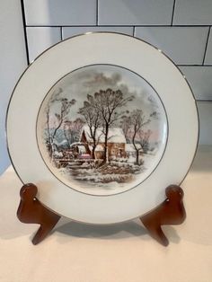 a plate with a horse on it sitting on a counter