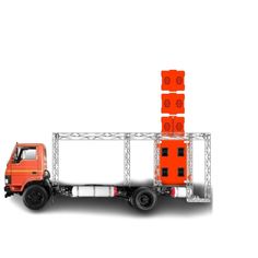 a red truck with orange blocks on it's flatbed is shown against a white background