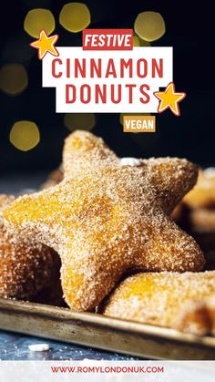 festive cinnamon donuts with vegan written on the top and stars in the middle