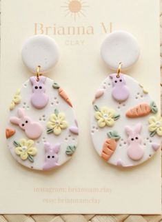 the earrings are made out of clay and decorated with bunny, carrots, and flowers