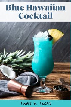 the blue hawaiian cocktail is garnished with pineapple