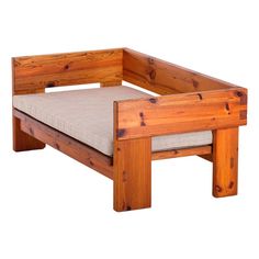 a wooden bench with a cushion on it