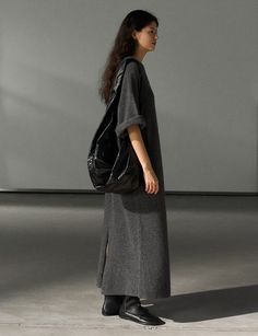 Knit-wool maxi t-shirt dress in dark grey . 89.2% sheep wool 7.6% yak wool 3.2% yak wool.Not itchy Slip on style Bust 46"/117cmLength 49"/125cmModel wears size S/M and is 5.8"/170 cmImported Plus Size Minimalist, Shirt Dress Maxi, Maxi Shirt Dress, Midi Maxi Dress, Wool Dress, Reduce Waste, Dress Maxi, Short Jumpsuit, Knit Shirt