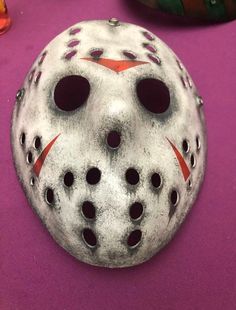 This mask is made from high quality pvc with an elastic strap. They are one of a kind and original, each in there own way. Don't worry The paint WILL NOT come off. Each mask is sprayed with a protective varnish to preserve the paint. These masks are hand painted/created, made by us. Each mask is a work of art created just for you! We hope you love it just as much as we do!! Processing time to create takes 5-7 business days. Mask colors and markings will vary due to it being hand painted. Any que Adjustable White Masks And Prosthetics, Adjustable White Mask, Themed White Masks And Prosthetics, Jason Voorhees Costume, Jason Mask, Jason Voorhees, Cool Masks, Costume Mask, Grey Stone