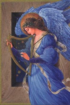 an angel holding a harp in its right hand