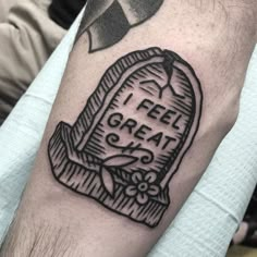 a black and white tattoo with the words i feel great on it's arm