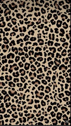 an animal print fabric with brown and black spots