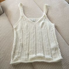 Cream Colored, Crochet Style Top With Full Coverage On Bra Area And Looser Knit Through The Rest Of The Top Size Medium, Fits Slightly Large Never Worn, No Signs Of Wear Or Damage Casual White Crochet Top With Knit Fabrication, Crochet Style, Knit Tank, Knit Tanks, Crochet Fashion, Cream White, Cream Color, Abercrombie Fitch, Top Styles