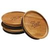 three wooden coasters with the word gourmet on them