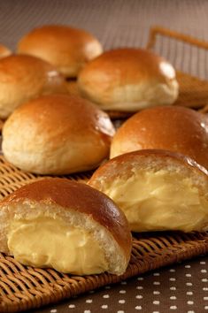 some rolls are sitting on a wicker tray