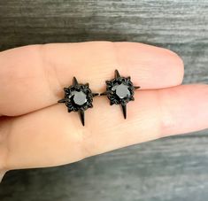 The Starburst stud earrings with Black CZ are the perfect accessory for those who love gothic and celestial styles. The shiny cubic zirconia stone adds a touch of elegance, making them a beautiful addition for both men and women. With their unique design and high-quality materials, these earrings are a must-have for any fashion-forward individual. Sold as Pair or Single Material: 316 Stainless steel Size: 14 mm long ,12mm wide Post:Regular piercing 24G Closure: butterfly push back Listing for pair of stud only *RETURNS / REFUNDS * -If you would like to return you purchase , please contact us within 7 days of receiving your package and we will accept the return.Return will only be made to the product, and not the shipping cost.  -Buyer is  responsible for the return shipping costs . -All je Gothic Stud Earrings, Black Emo Earrings For Gift, Black Pierced Emo Earrings, Nickel Free Black Piercings Gift, Nickel-free Black Piercings As Gift, Nickel-free Black Piercings As A Gift, Nickel-free Black Piercings Gift, Black Nickel Free Piercings As A Gift, Punk Style Black Piercings For Gift