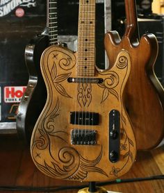 an electric guitar is on display in a store