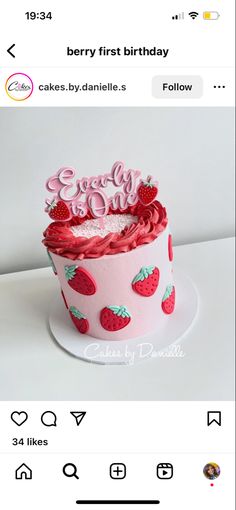 a birthday cake with strawberries on it