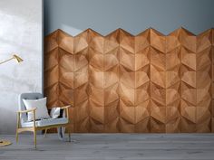 a modern living room with wood panels on the wall and a chair in front of it