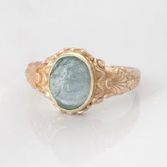 This vintage style sea-themed signet ring, featuring beautiful little shells and ocean-inspired fluorishes all around the center which displays a lovely seafoam green tourmaline cabochon. You may also select from other available gemstones shown such as citrine, pink tourmaline, peridot and aquamarine.  (NOTE: Please SELECT and state in the order notes the stone you prefer in the listing! Please also note that gemstones can vary slightly in color and texture. Upon request, we can send a photo of Lily Ring, Green Stone Ring, Ring Inspo, Unique Rings Vintage, Green Stone Rings, Yellow Gemstones, Signet Rings, Monogram Ring, Ring Birthstone